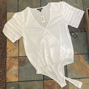 Express Womens Blouse. New with Tags. White. Size Medium.